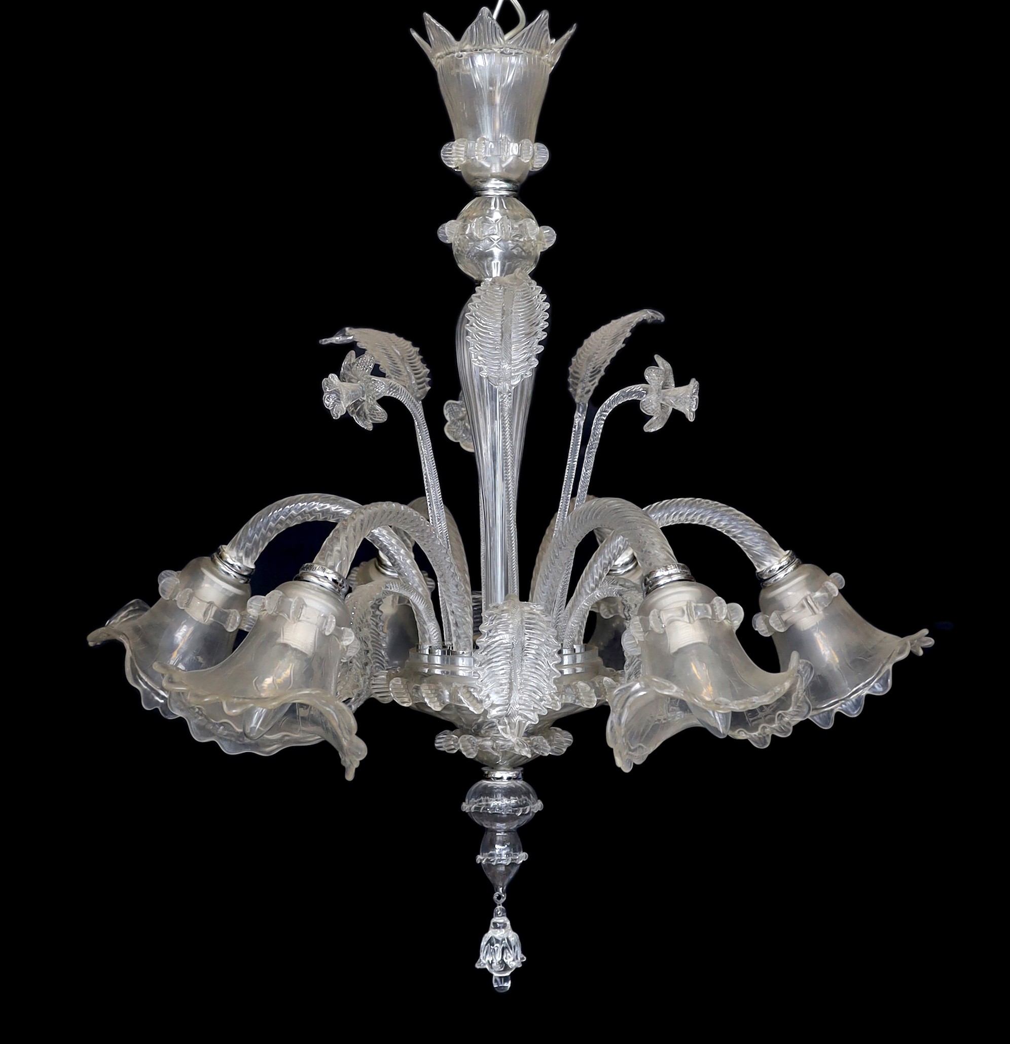 A Venetian clear glass six light chandelier with ornate foliage and flower motifs, height 85cm. width 74cm
